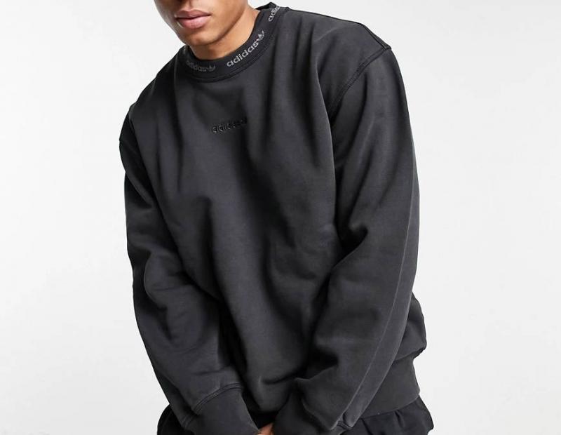 Feel Cozy Yet Stylish This Fall in The adidas Tiro 21 Sweat Hoodie