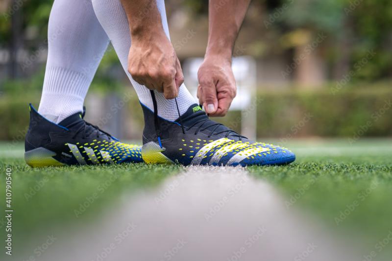 Finding Comfort on the Field: How to Pick the Right Soccer Cleats for Flat Feet