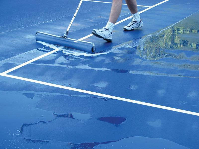 Need A Clean Tennis Court Fast: Use This Genius Tennis Court Squeegee Roller Trick