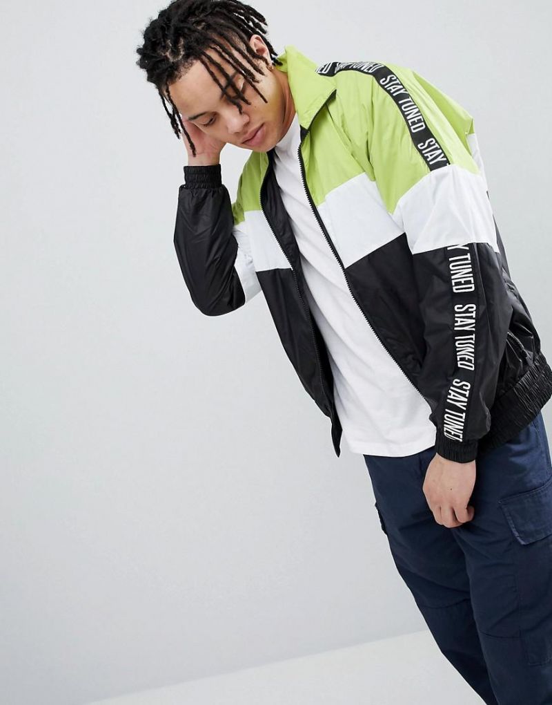 Stay Dry and Look Sharp  The Best New Balance Windbreaker Jackets for Men