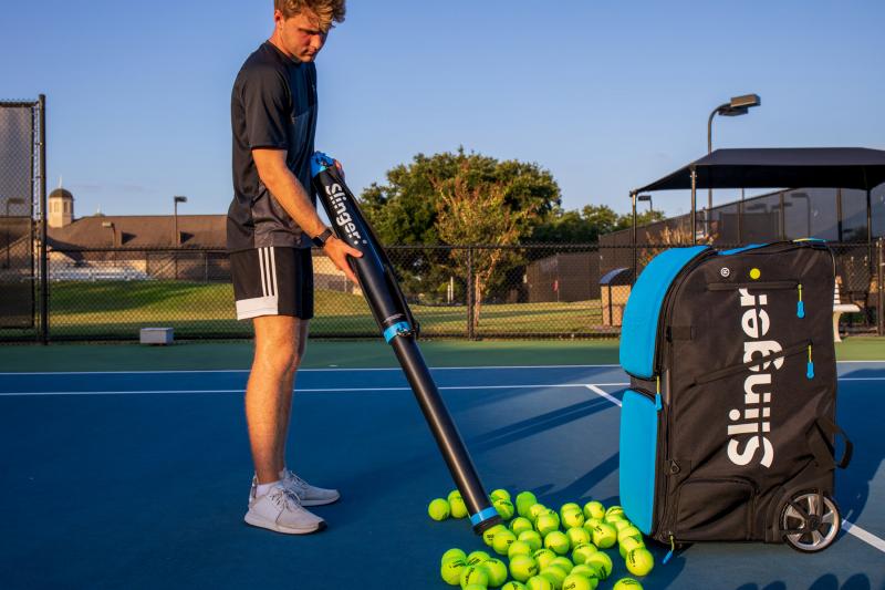 Still Using Old Methods to Pick Up Tennis Balls. A Pitchback Machine Is The Modern Solution